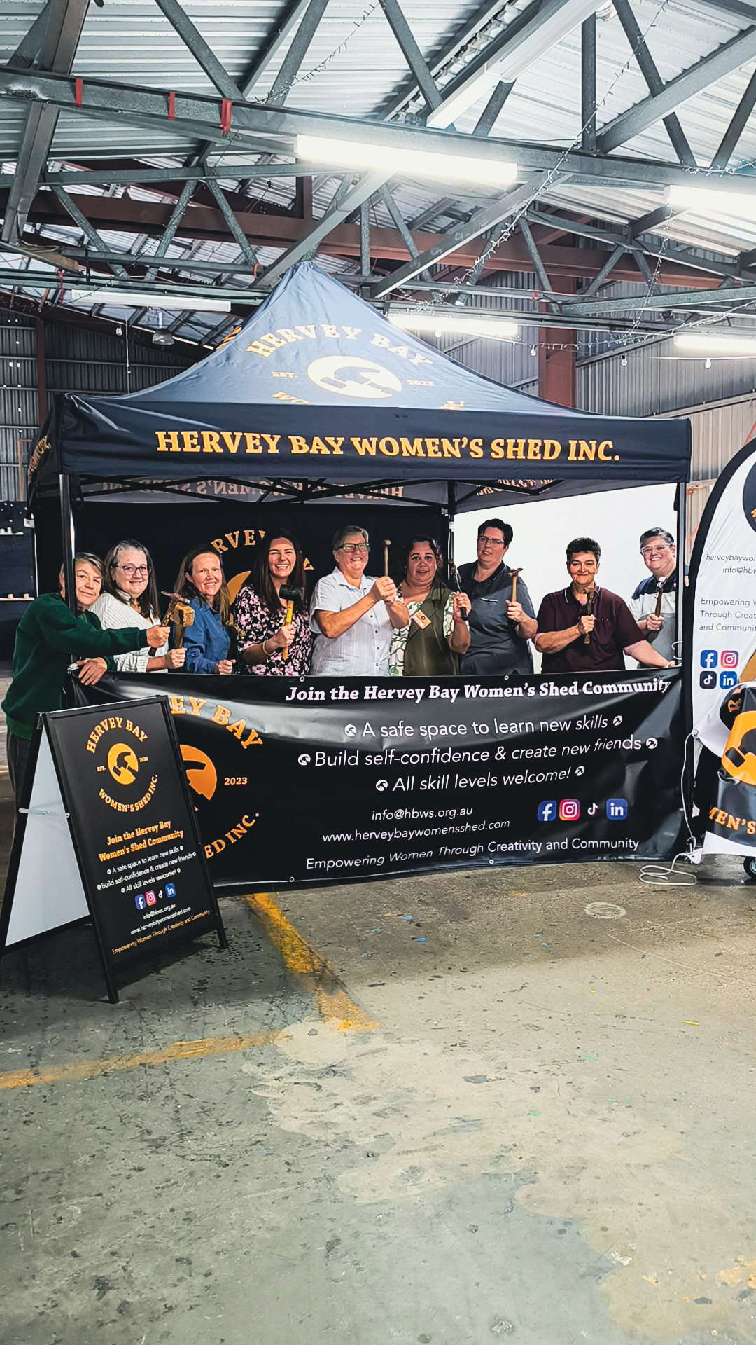 HBWS Members taking a photo with our new promotional gear funded by the Fraser Coast Regional Council and made by local business Prestige Signage and Window Tinting